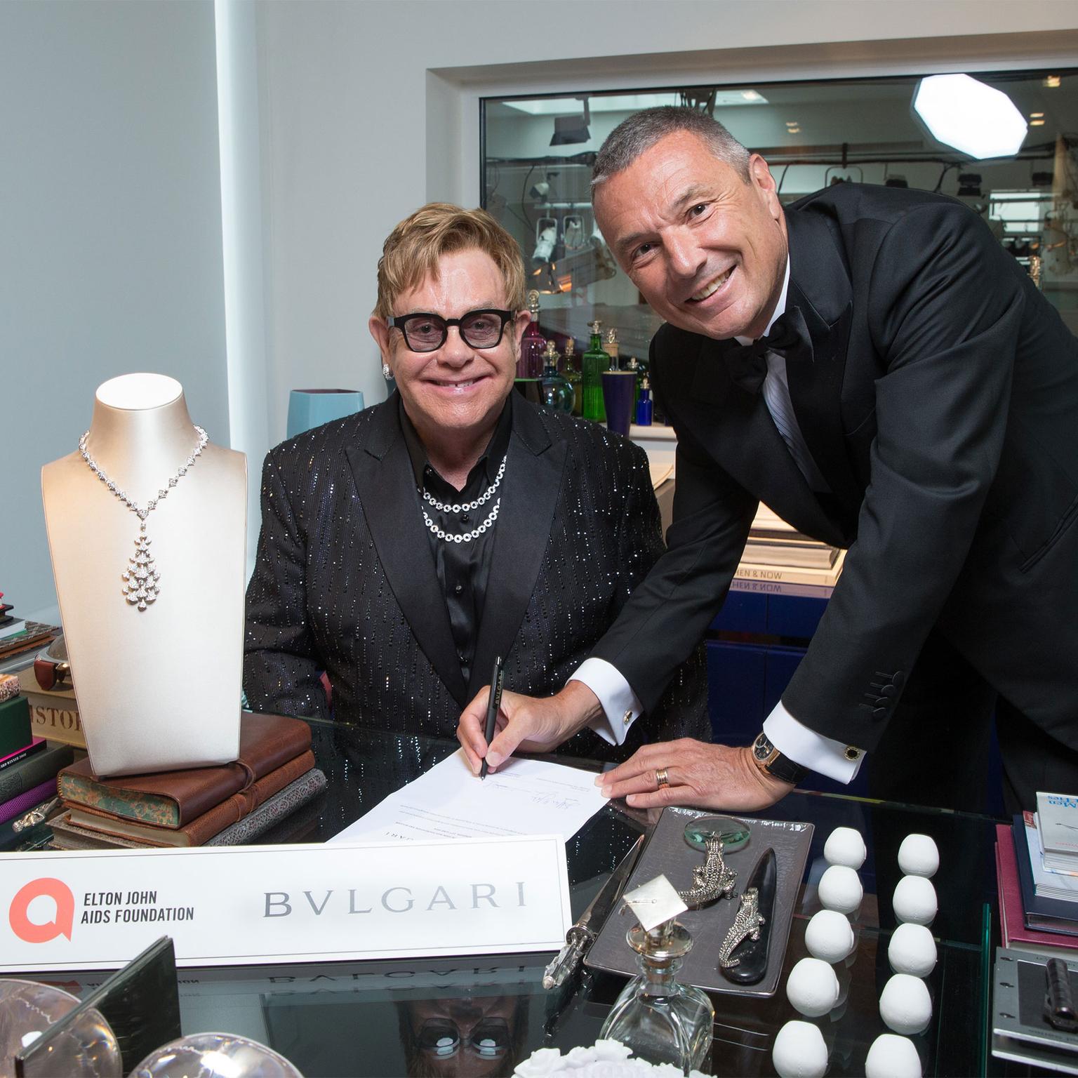 Sir Elton John and Jean Christophe Babin with Bulgari's Diva's Dream necklace