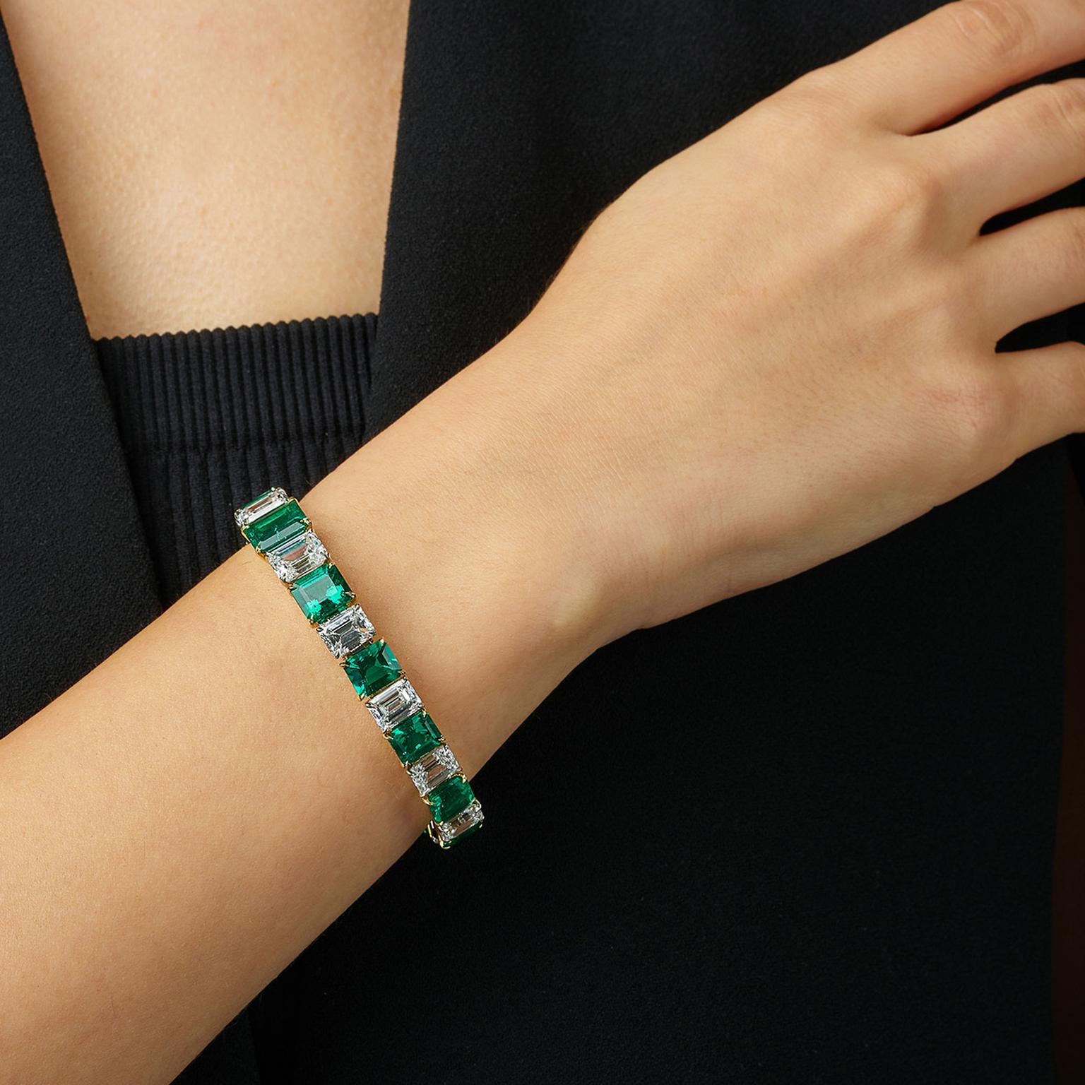 Lot 582 emaral and diamond bracelet for Phillips auction on model