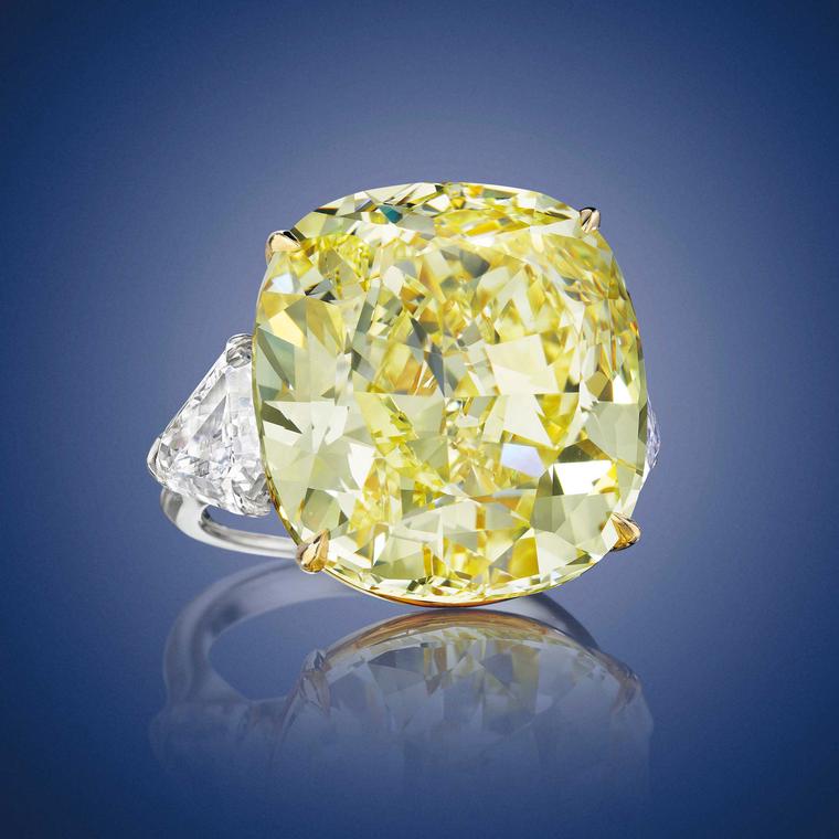 Cushion-cut fancy intense yellow diamond ring