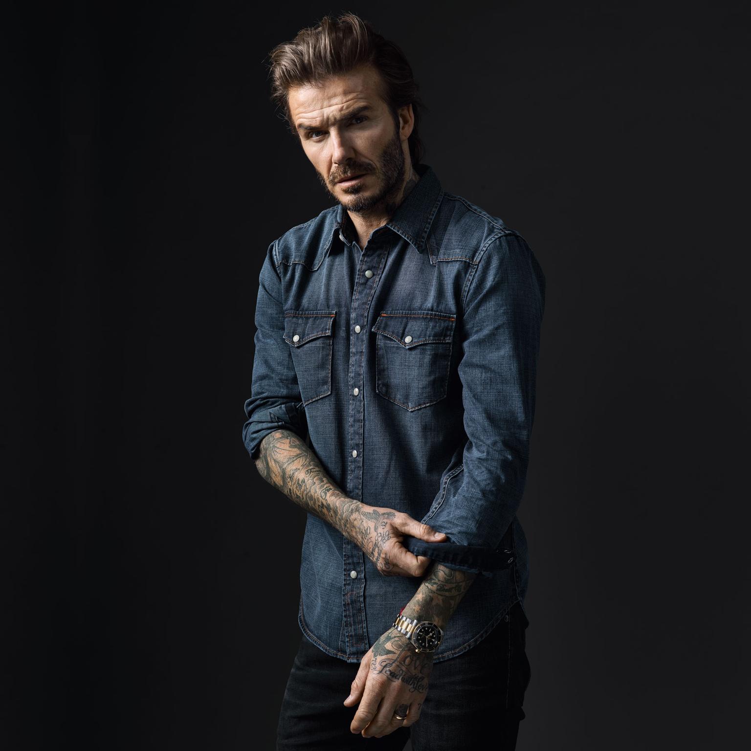 Tudor Born to Dare watch campaign featuring David Beckham in a denim shirt