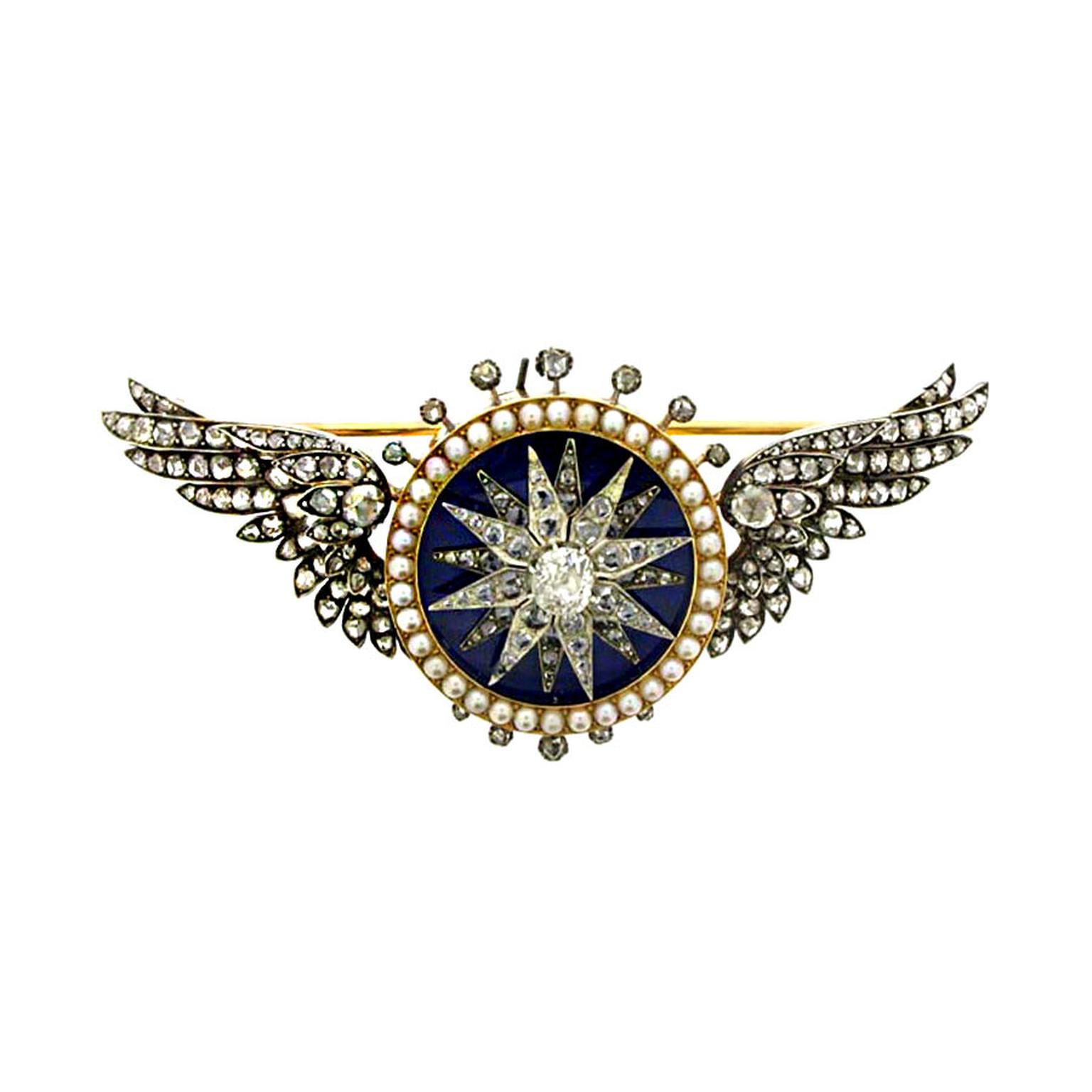 Berganza diamond pearl and enamel automated turban brooch Garrard