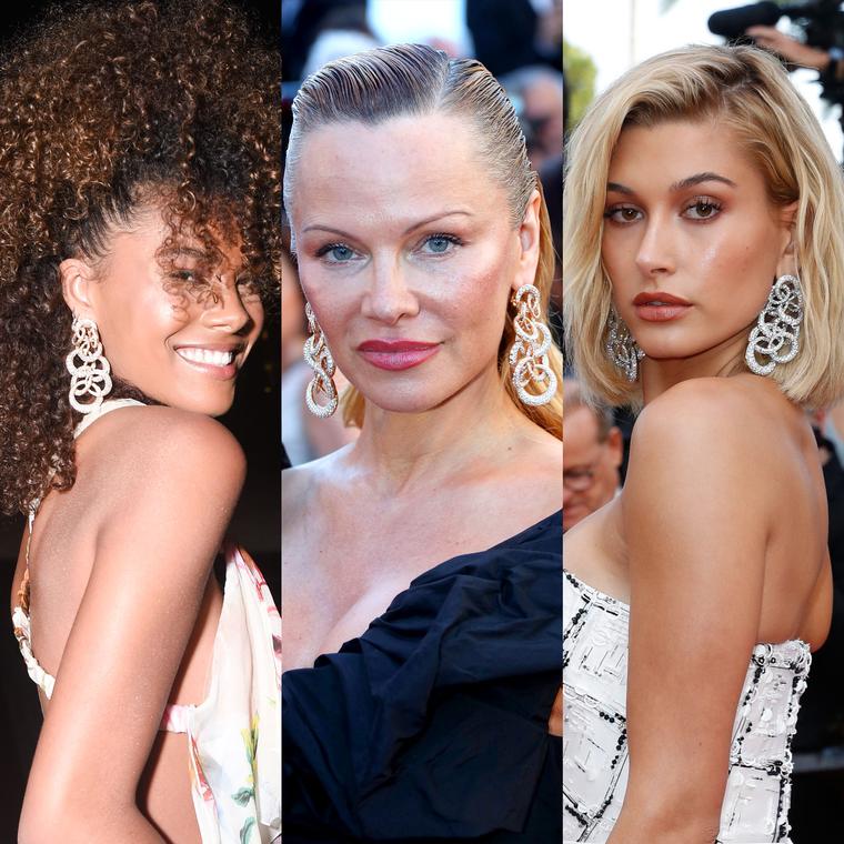 Tina Kunakey, Pamela Anderson and Hailey Baldwin wear the same de GRISOGONO Anelli earrings on the Cannes Film Festival red carpet