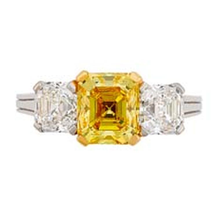 Three stone yellow and white diamond engagement ring