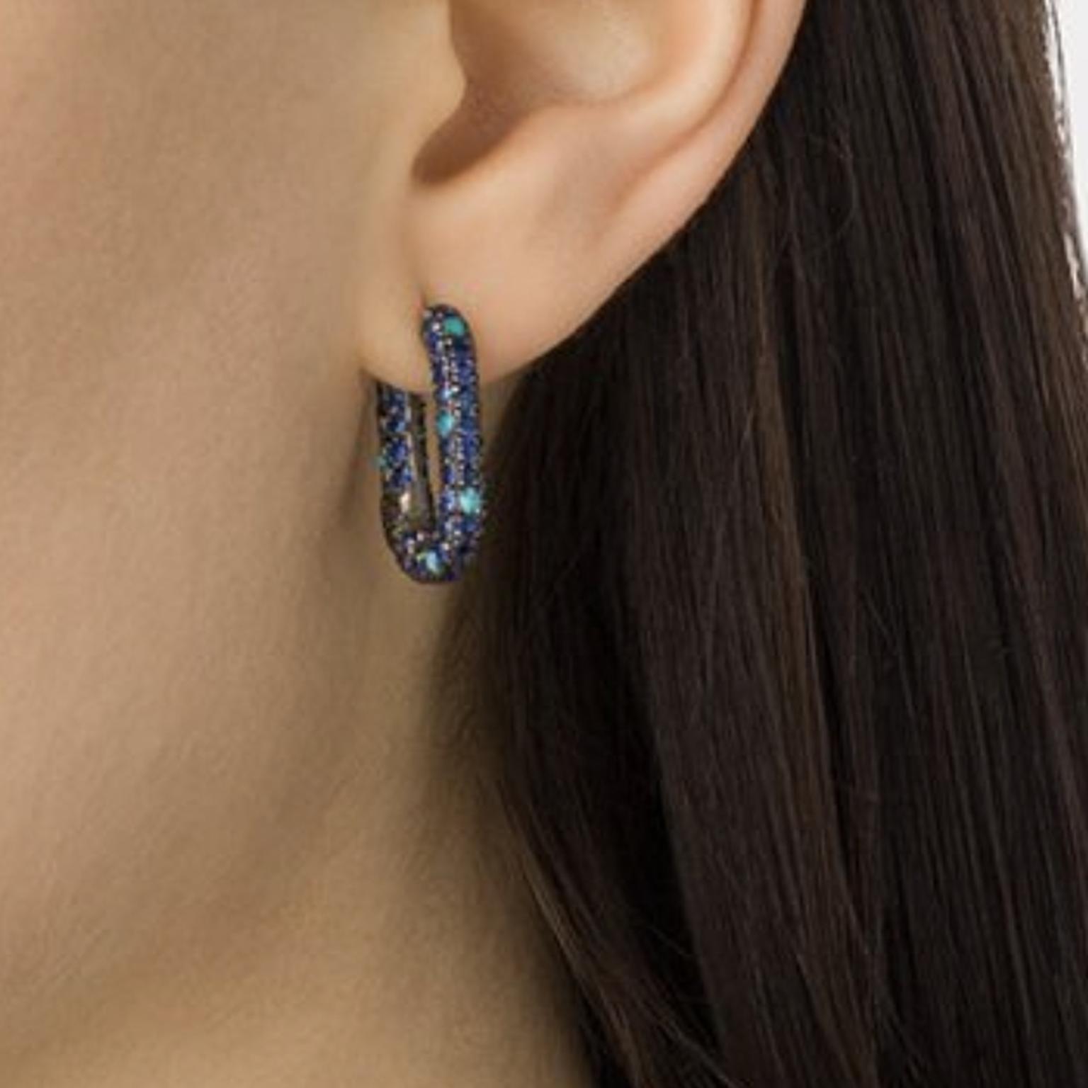 Turquoise and sapphire earrings by Selim Mouzannar on model