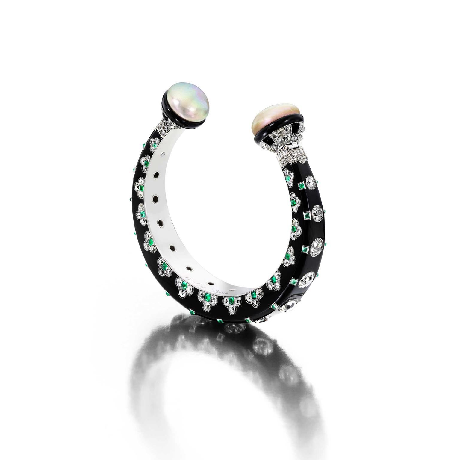 Siegelson Art Deco diamond, natural pearl, emerald and onyx bangle by Cartier