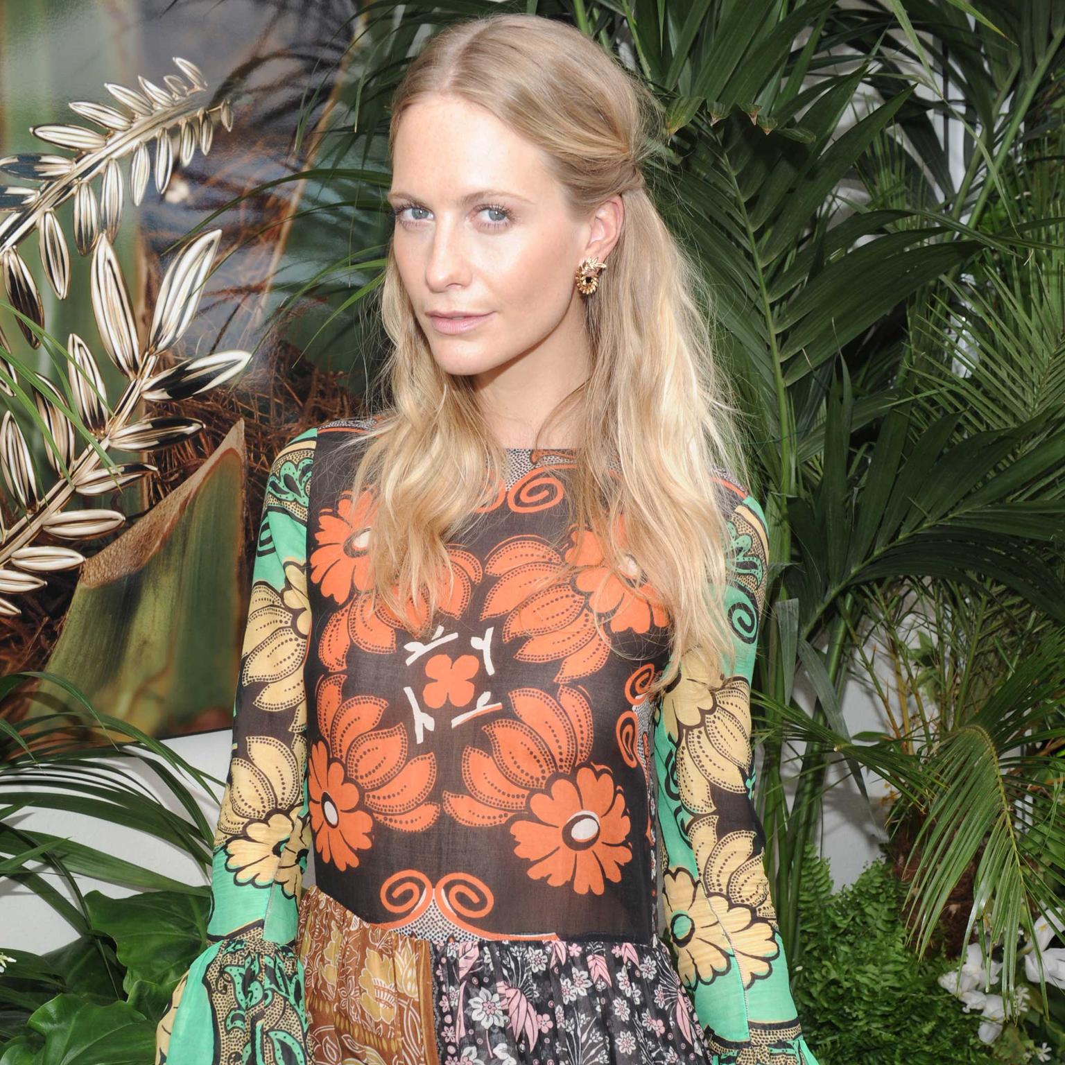 Poppy Delevingne in Chopard Palme Verte earrings