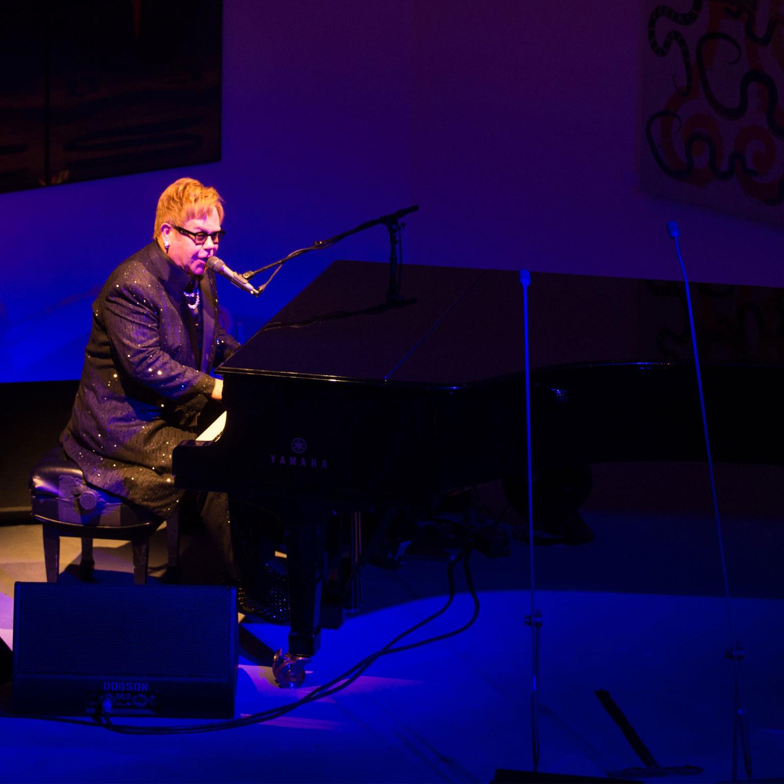 Sir Elton John performing at his AIDS Foundation Dinner