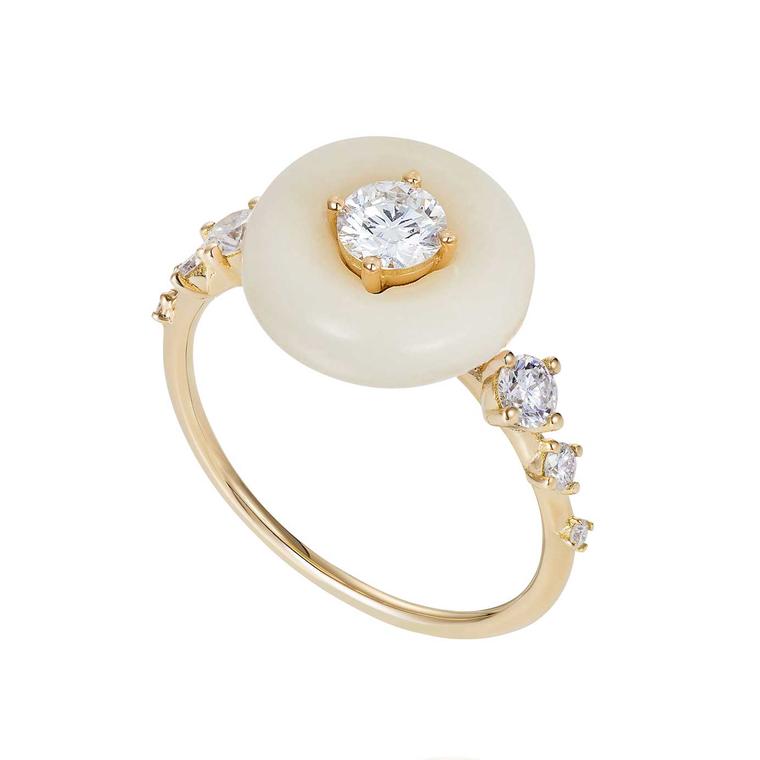 Fernando Jorge’s Surround Orbit ring places a 0.52-carat diamond inside a plump circle of tagua nut on a dainty yellow gold band. 