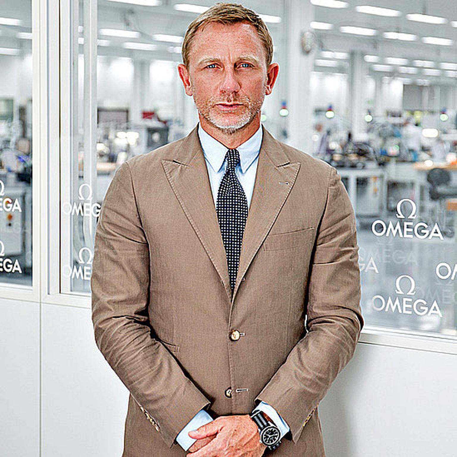 Daniel Craig at Omega manufacture wearing the Omega Seamaster Spectre