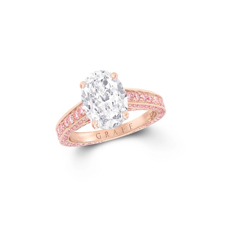 Flame oval diamond engagement ring with pink diamonds