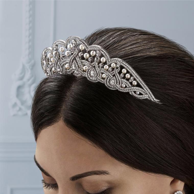 An 18ct white gold Garland tiara, set with white pearls, pearshape and round white diamonds (model)