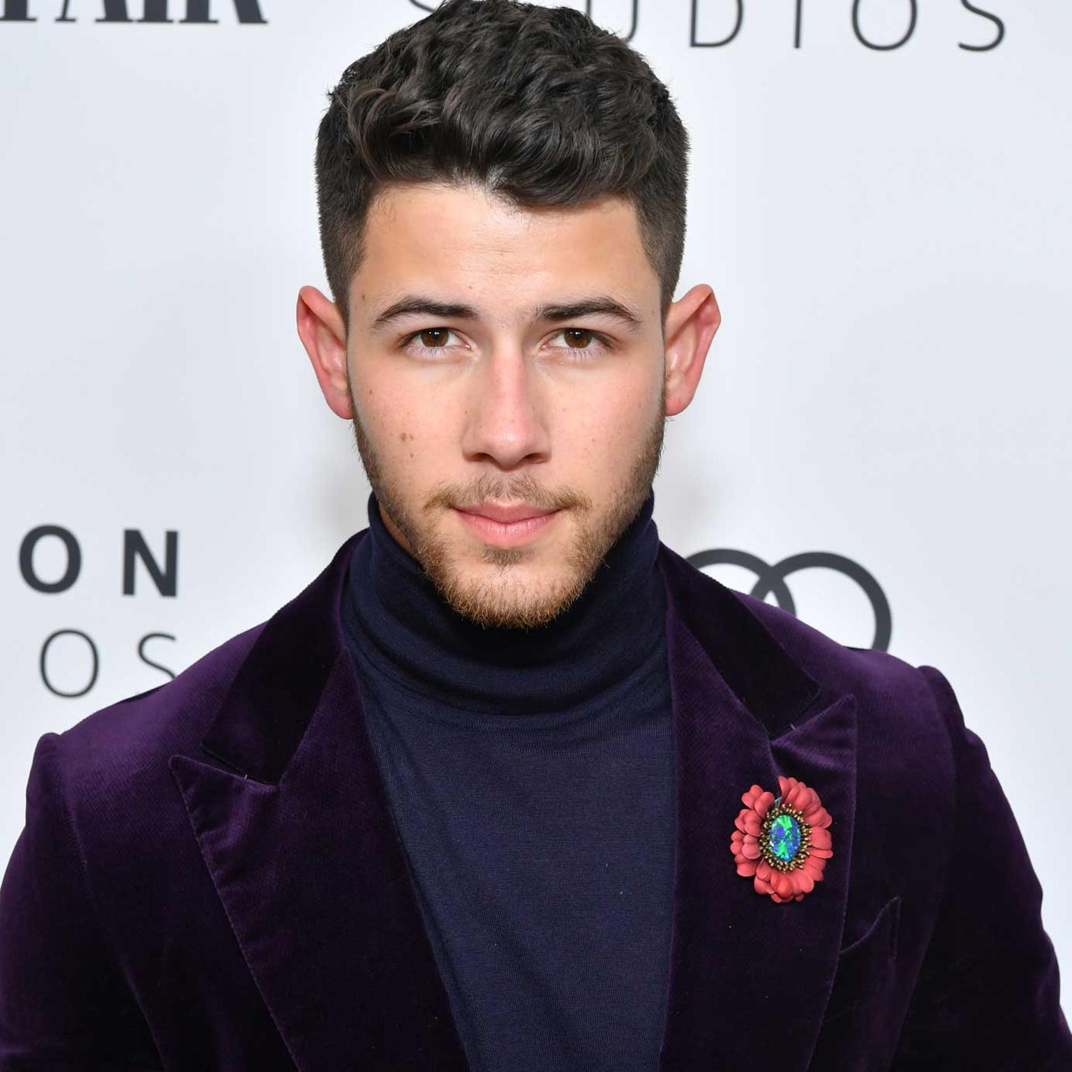Nick Jonas Golden Globes Chopard brooch jewel