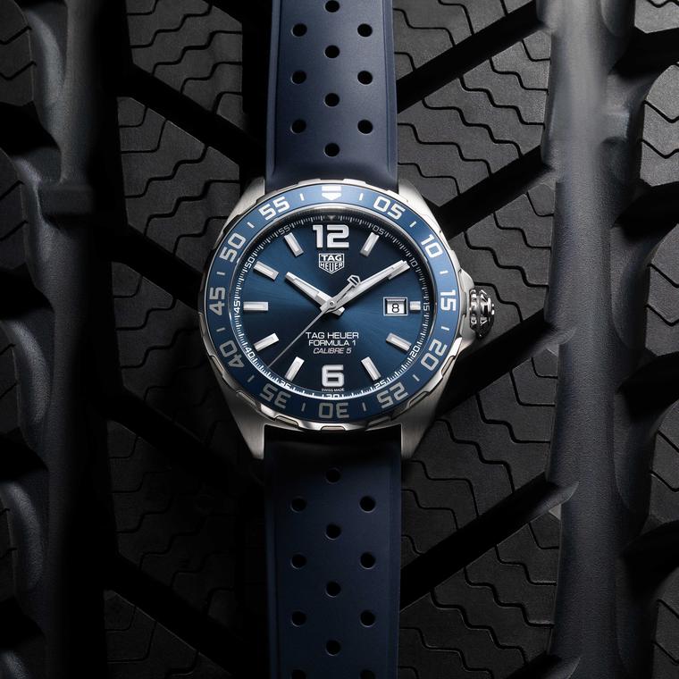 TAG Heuer Formula 1 Bucherer Blue Edition watch on rubber strap on tyre