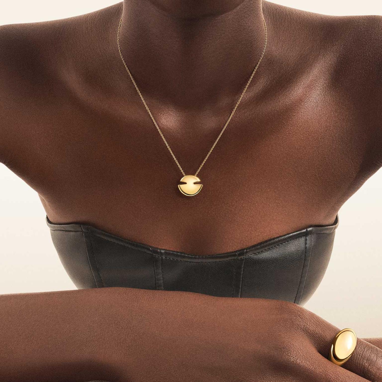 Bulgari Cabochon yellow gold pendant and ring on model