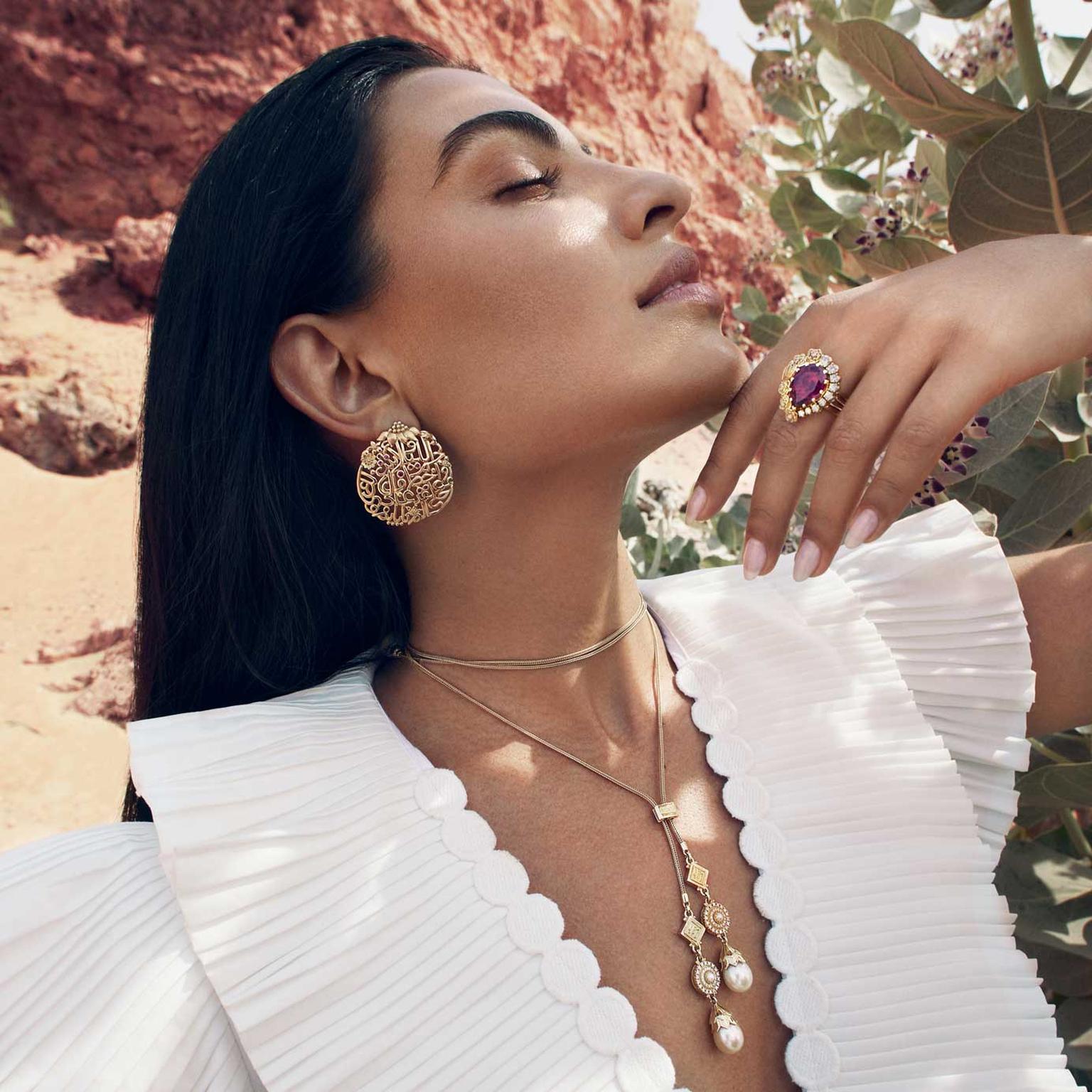 Calligraphy Earrings and Blossom Ring on model Azza Fahmy Jewellery Wonders of Nature: Reimagined