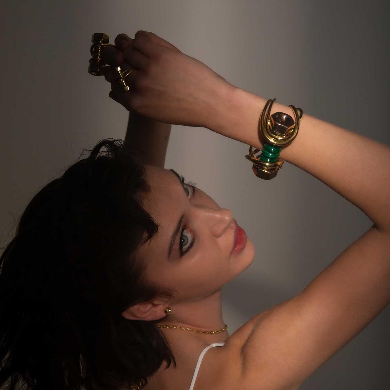 Hannah Martin New Act of Rebellion bolt rings and bracelet on model