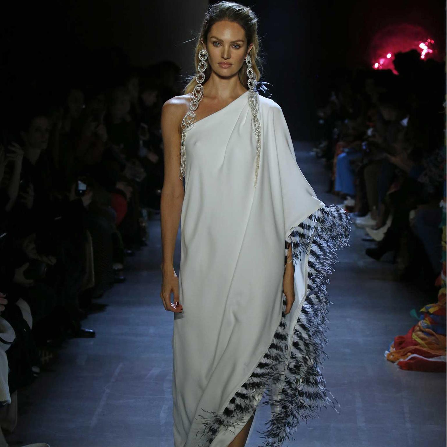 Candice Swanepoel wearing TASAKI earrings