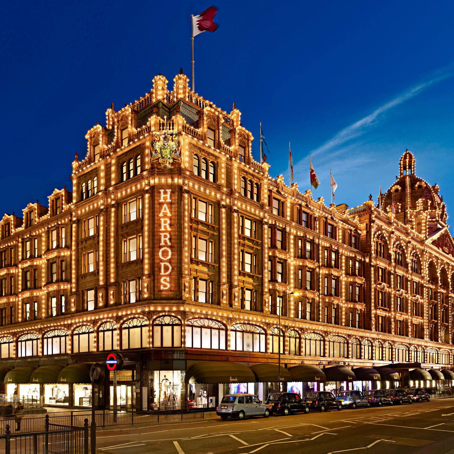 Exterior of Harrods department store at night