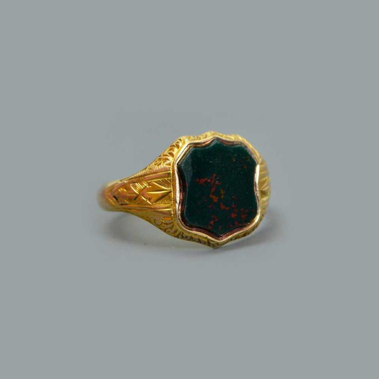 Foxing's shield-shaped signet ring