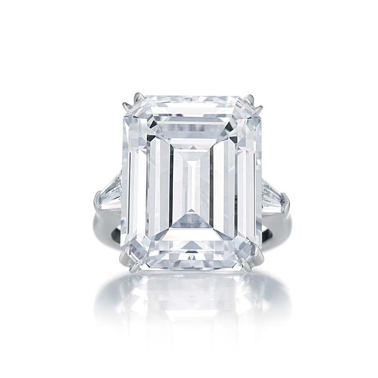 Harry Winston Classic Winston emerald-cut diamond engagement ring in platinum with tapered baguette side stones.