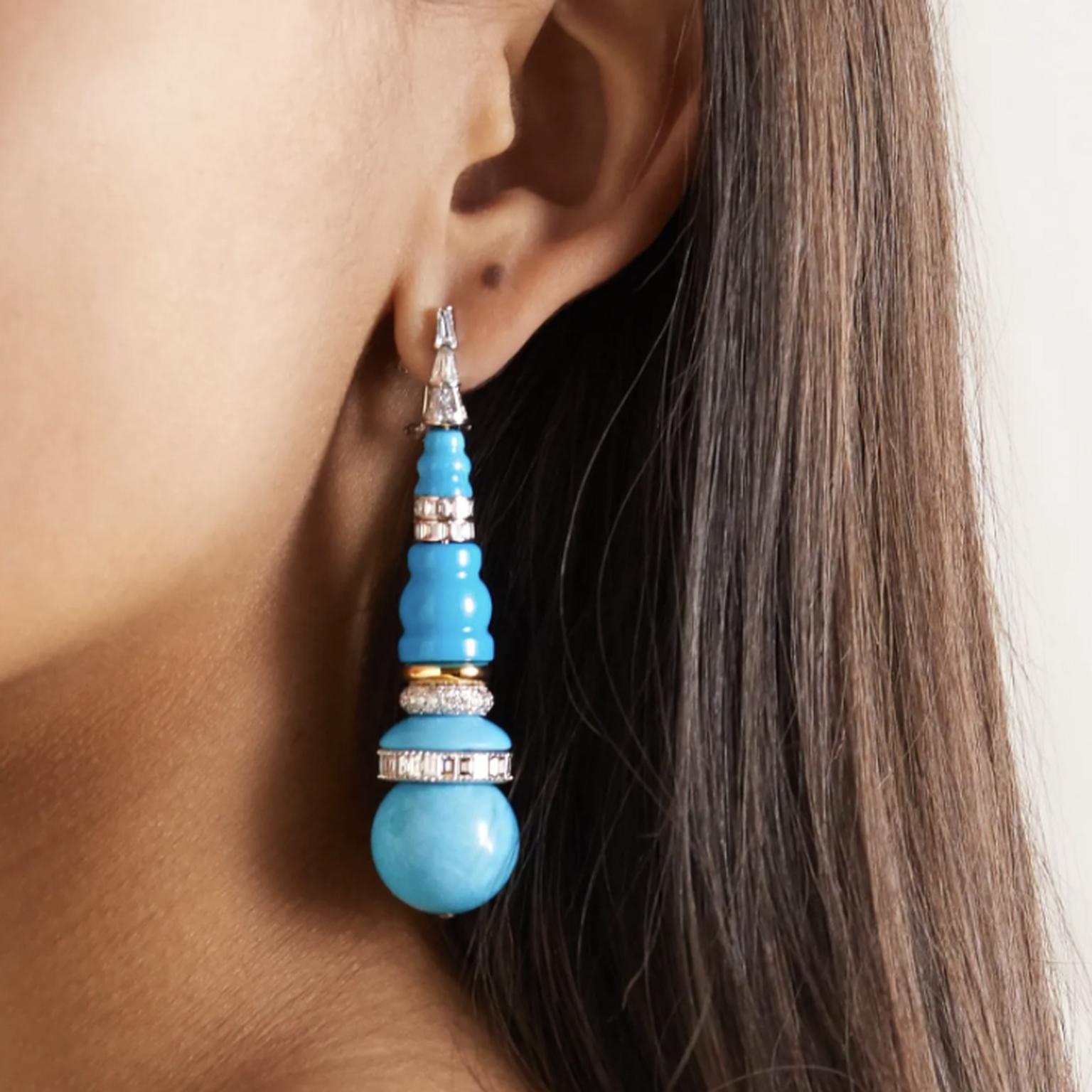 Turquoise earrings by Bina Goenka on model