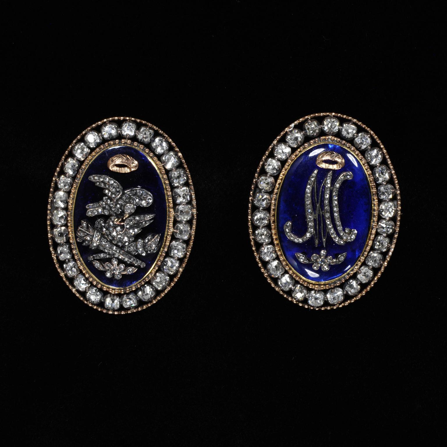 Bracelet clasps, France, Gold with brilliant cut diamonds, central plaques of blue paste (glass). © Victoria and Albert Museum, London