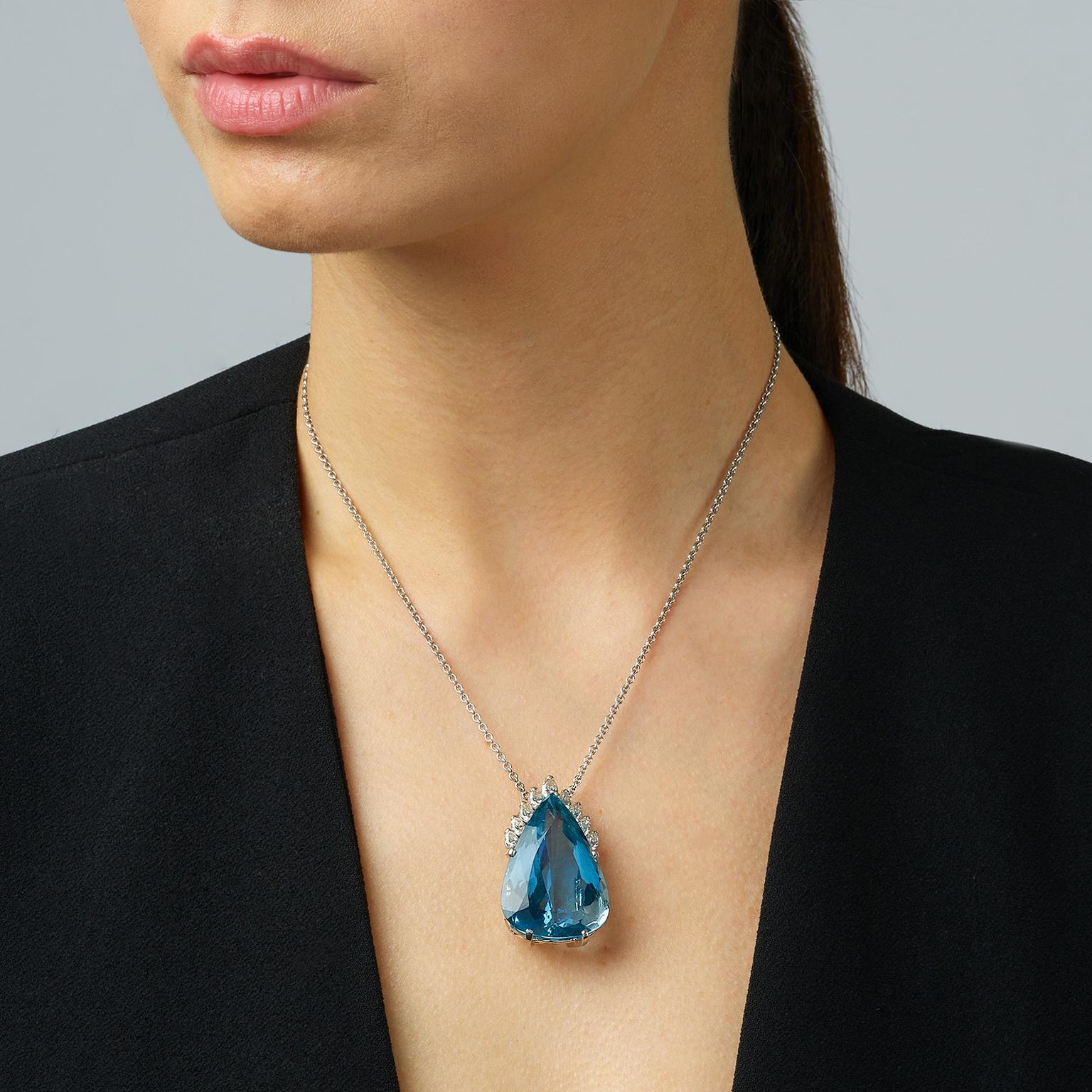 Lot 584 Aquamarine and diamonds brooch pendant Phillips auction on model