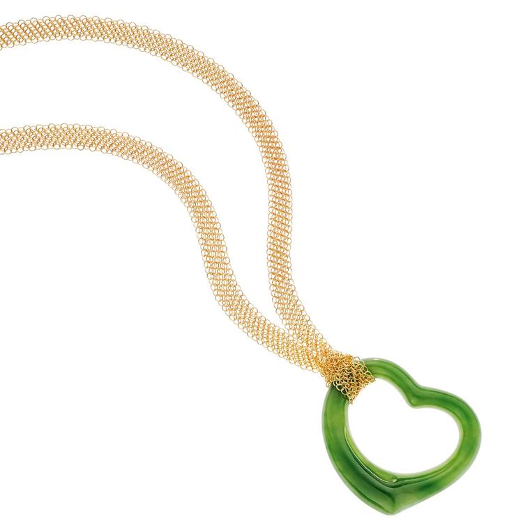 Elsa Peretti Open Heart green jade pendant on a gold mesh chain