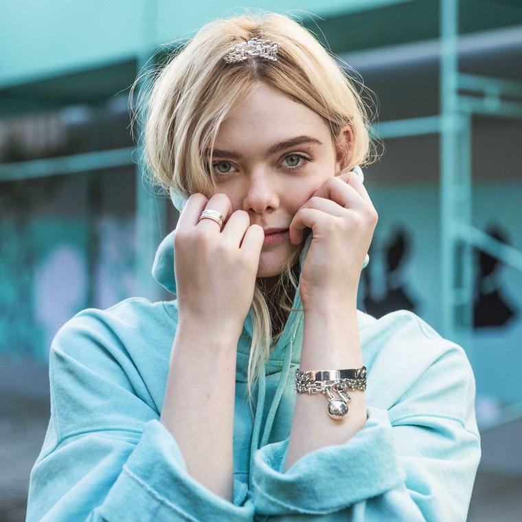 Elle Fanning is the star of Tiffany’s new advertising campaign, and like Audrey Hepburn she wears a mini tiara 
