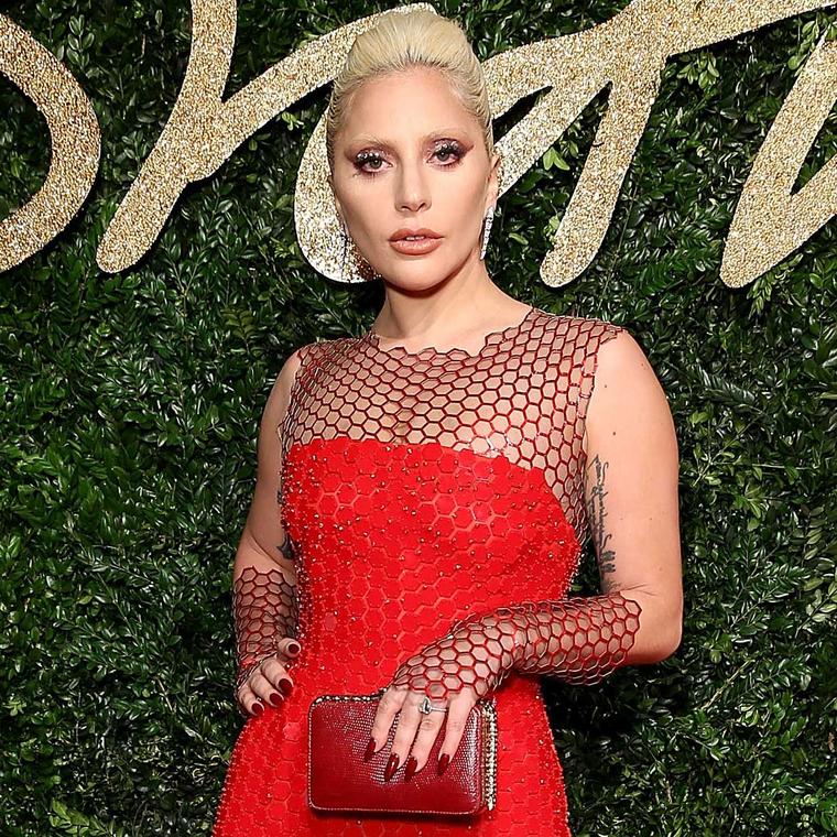 Lady Gaga in diamond Bulgari Serpenti earrings at the British Fashion Awards