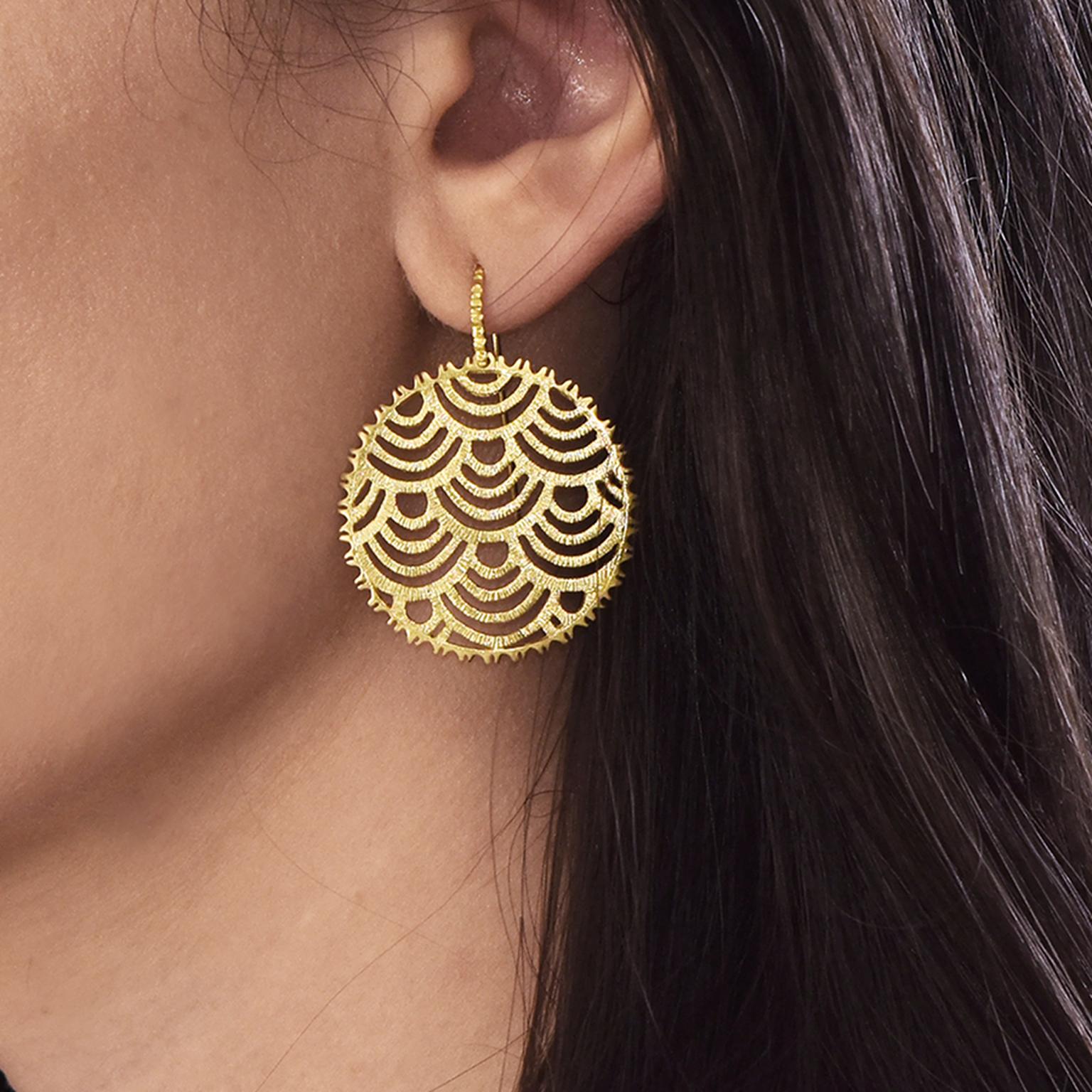 Nubia earrings on model by Lalaounis