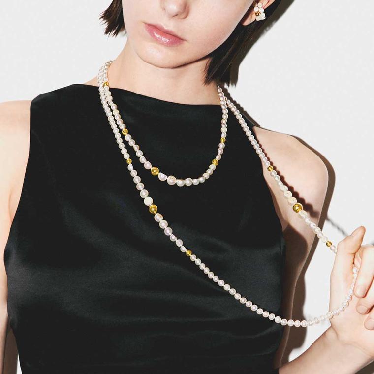 M/G TASAKI Sliced Sphere long necklace and ear cuff on model
