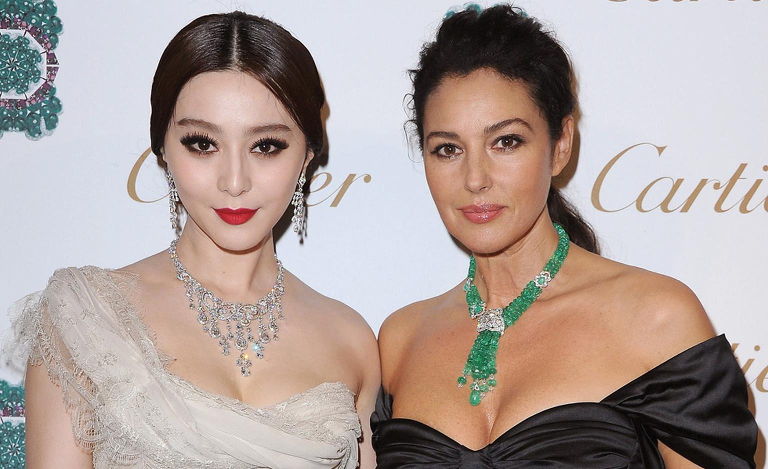 Fan Bingbing and Monica Belluci, a Cartier Ambassador, at the launch of  Sortilège de Cartier jewels in Rome.