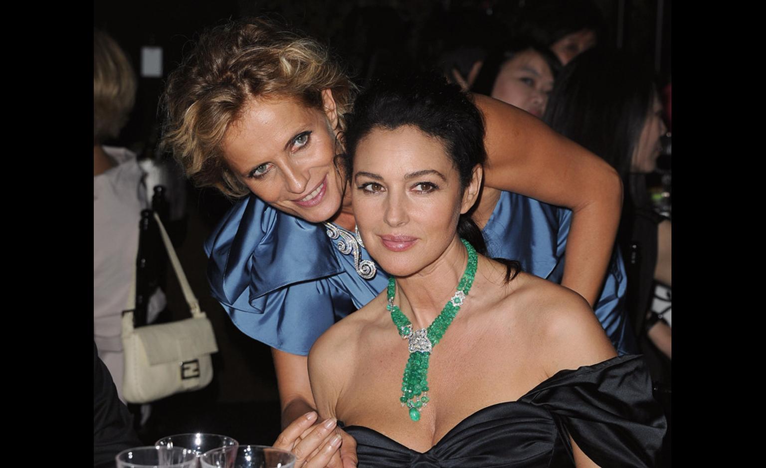 Isabella Ferrari with Monica Belluci at the dinner by chef Emanuele Scarello to celebrate the launch of Cartier's high jewellery collection.