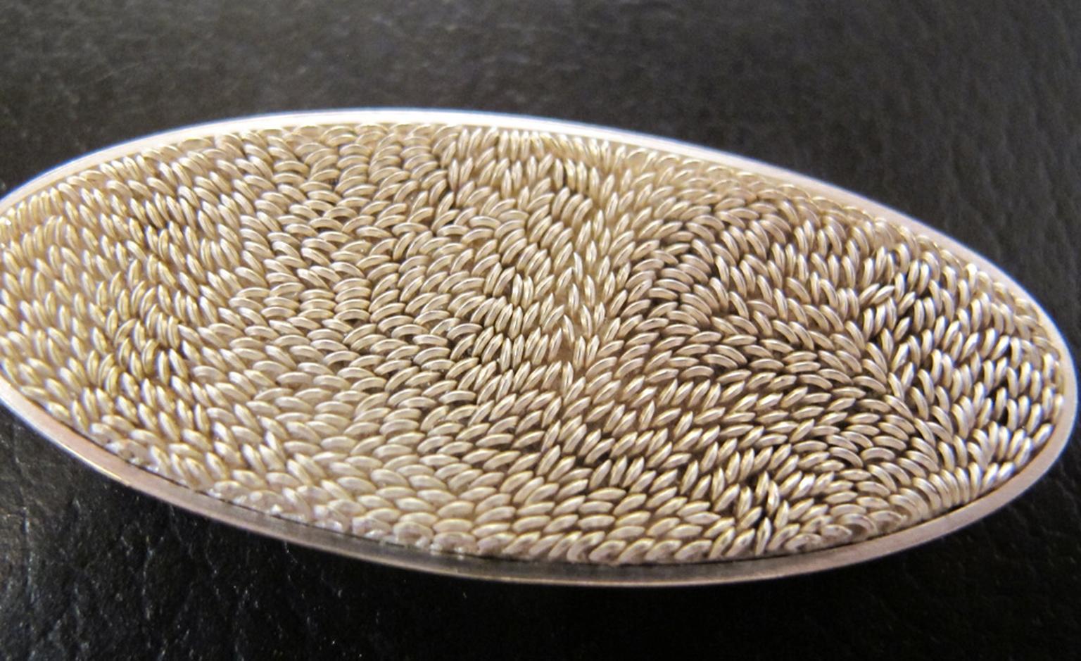 'Untitled' Andrew Lamb brooch in silver and white gold £4,500.