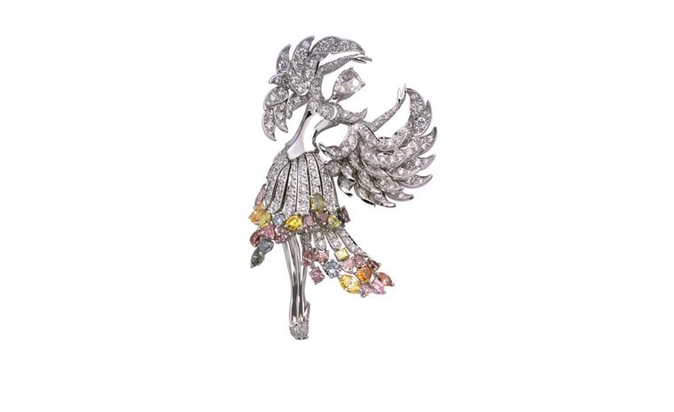 VAN CLEEF & ARPELS. Isadora clip in white gold, coloured diamonds, princess and rose-cut diamonds. POA
