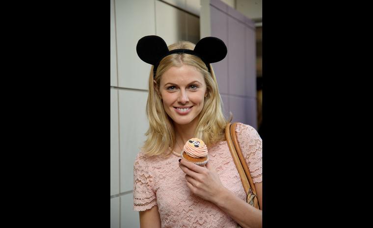 Donna Air dons ears before indulging in a cupcake at Chopard's launch of the Happy Mickey collection in London.