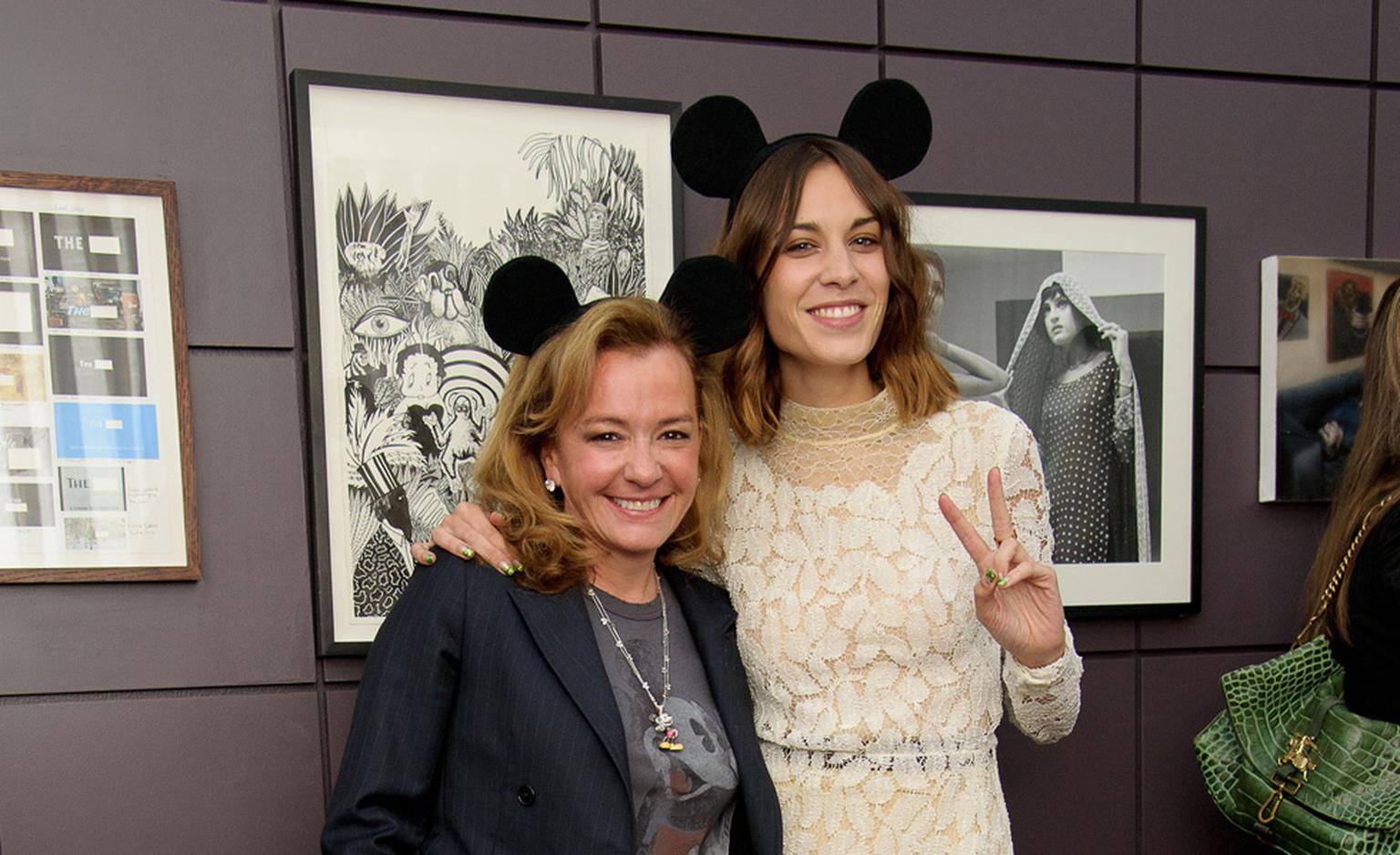 'Ear, 'ear. Caroline Scheufele, co-President of Chopard, with Alexa Chung.