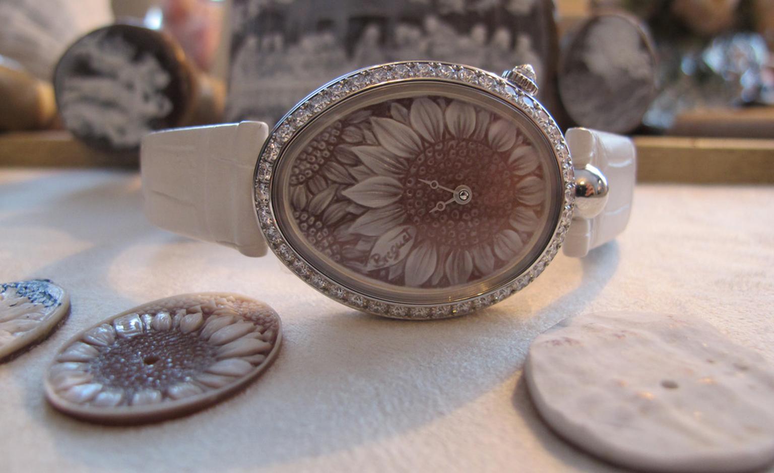 A finished Breguet Reine de Naples watch with a sunflower dial in cameo.
