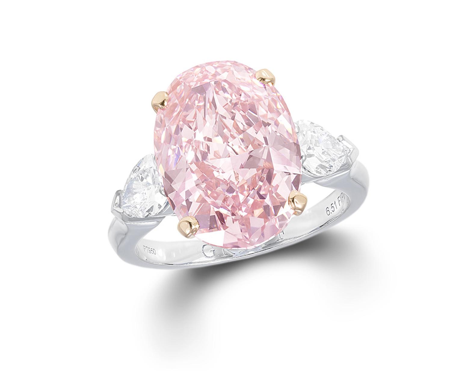 Graff Diamonds solitaire diamond ring, set with a 6.51ct oval cut Fancy Intense pink diamond