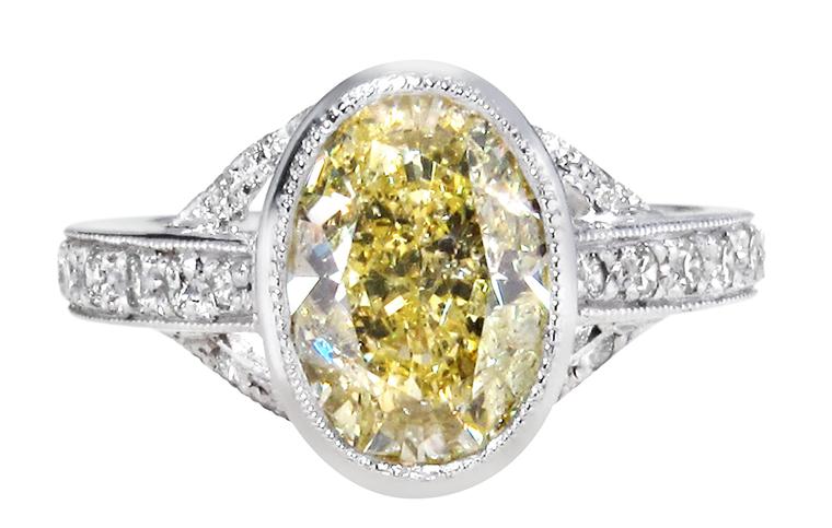 Ingle & Rhode bespoke VIntage engagement ring, set with an oval-cut 1.4ct fancy yellow diamond (POA)