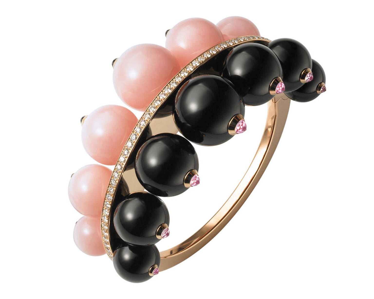 Cartier bracelet from the Évasions Joaillières Collection in pink gold, set with pink opals, onyx and diamonds