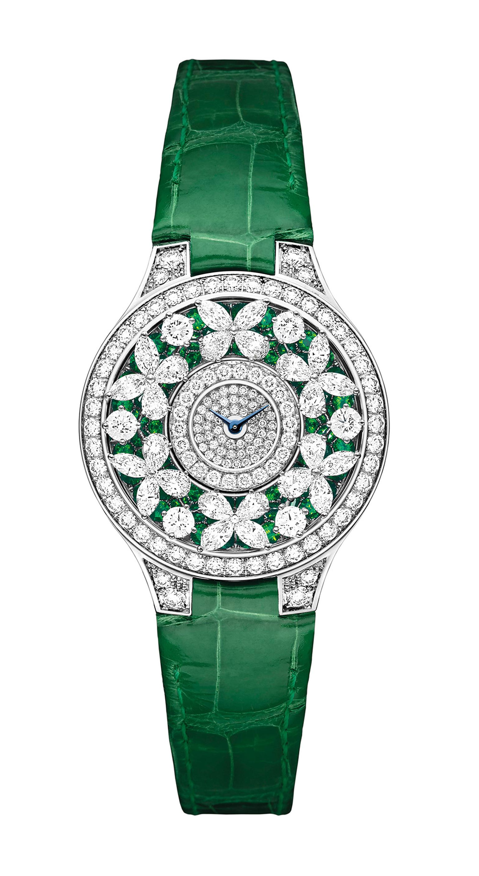 Graff Emerald Butterfly Watch in white gold, set with 335 diamonds, 78 emeralds and 22 diamonds on the buckle, and fastened with a green crocodile strap.