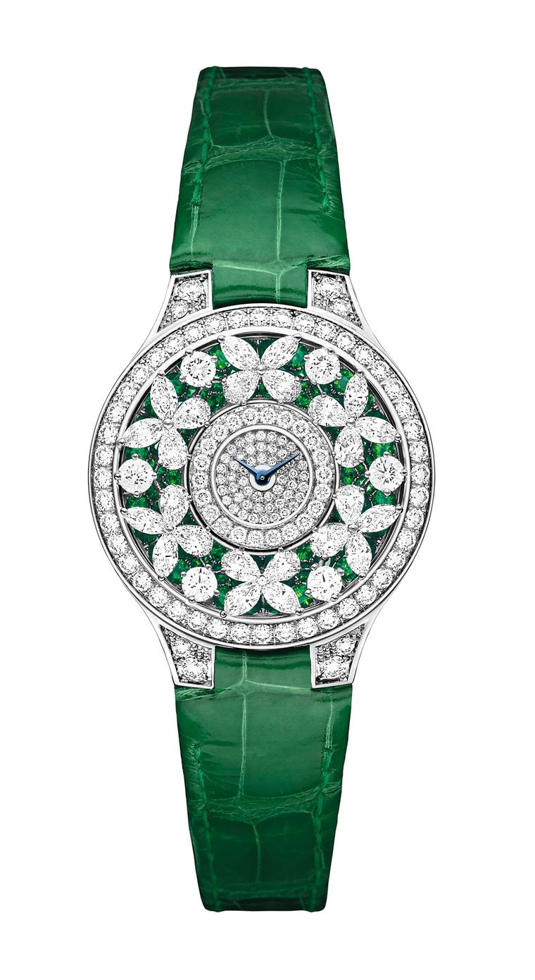 Graff Emerald Butterfly Watch in white gold, set with 335 diamonds, 78 emeralds and 22 diamonds on the buckle, and fastened with a green crocodile strap.