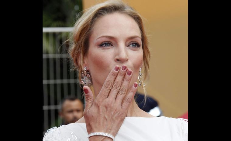 Uma Thurman, the American actress, member of the Jury, chose to wear a pair of 18ct white gold chandelier earrings set with diamonds with a matching diamond-set white gold bracelet.