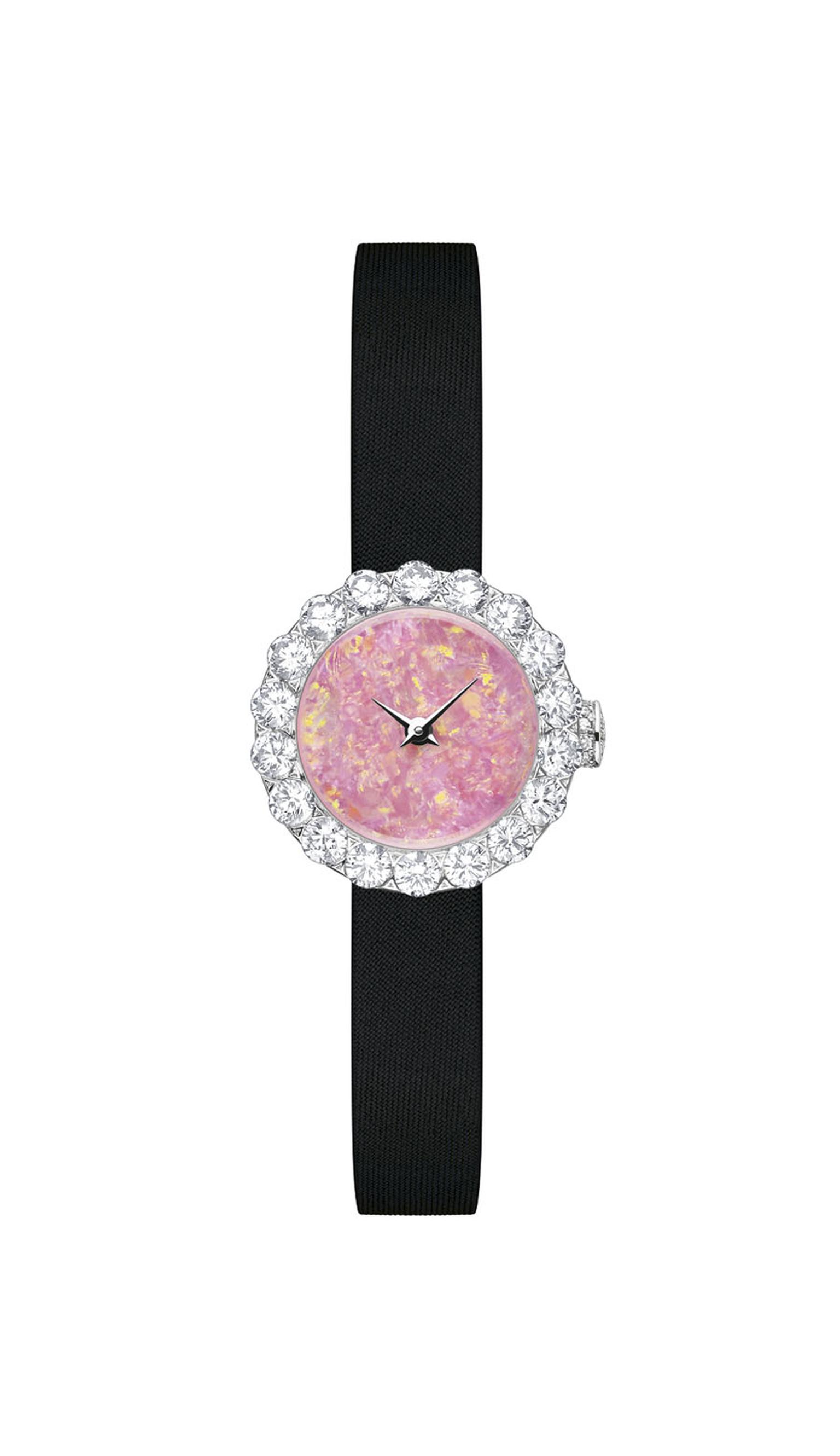 La D de Dior Preciéuse 21mm high jewellery watch in white gold with an Australian opal dial surrounded by diamonds.