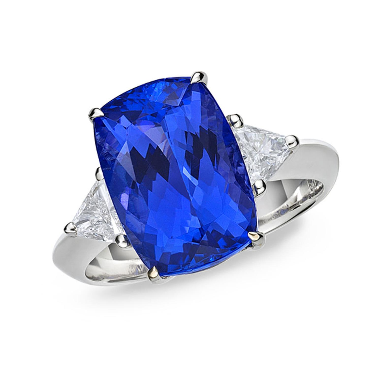 TanzaniteOne ring with a central tanzanite surrounded by two diamonds.
