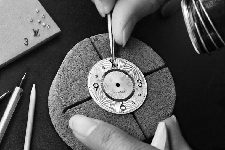 The Louis Vuitton Tambour Tourbillon watch dial, made from engraved mother-of-pearl, is adorned with a delicate Monogram pattern and two circles set with diamonds. © LOUIS VUITTON. Auteur: JAN TURNBULL.