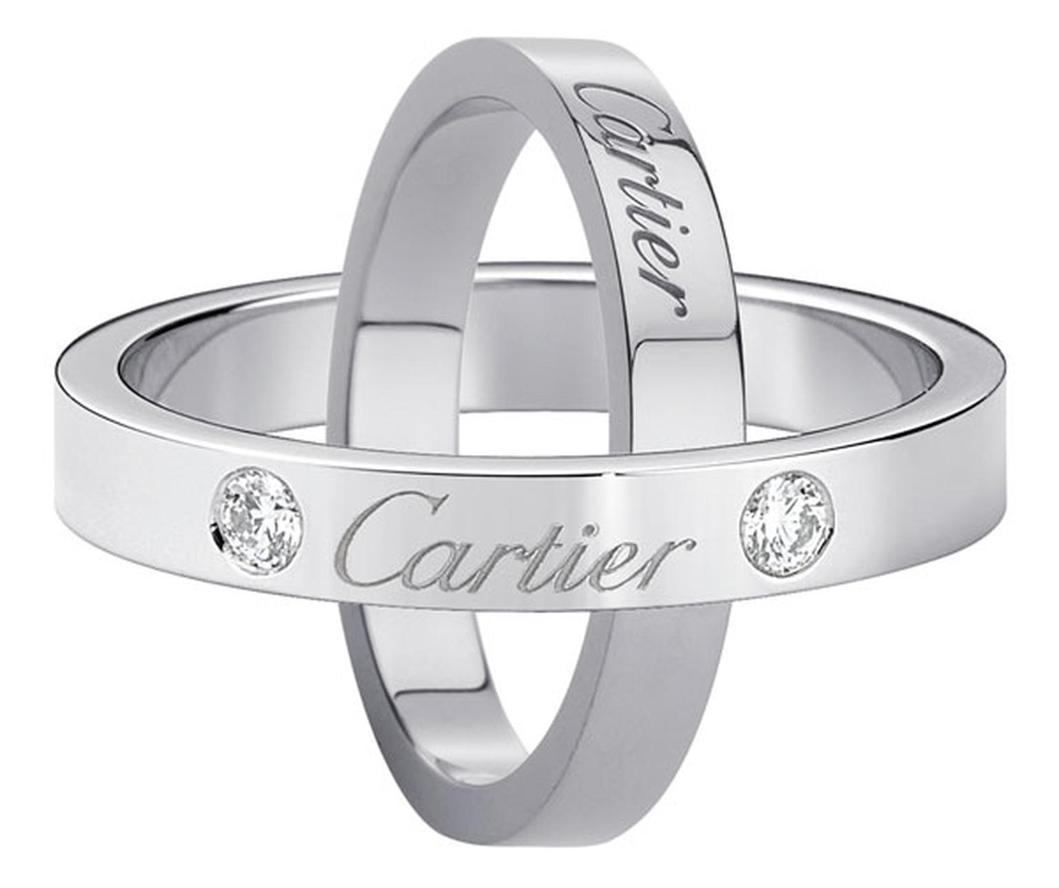 Cartier. Wedding rings engraved with Cartier  - Wedding ring engraved with Cartier, platinum, 2 diamonds; Wedding ring engraved with Cartier, platinum