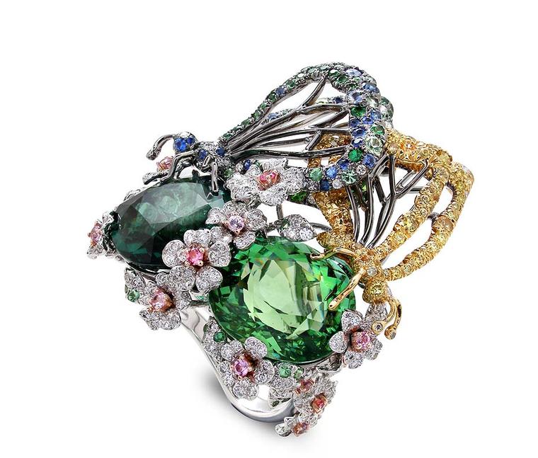 Anna Hu Butterfly Lovers ring in white and yellow gold, set with a 9.48ct green tourmaline, 9.88ct chrome tourmaline, diamonds and multi-coloured sapphires.